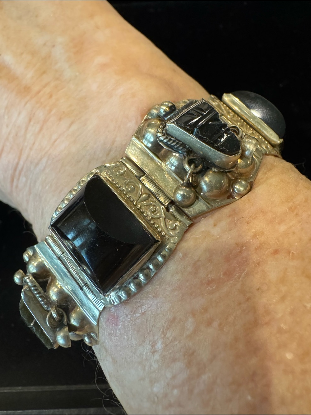 Vintage Silver-Tone 7” Bracelet with Black Onyx (?) Cabochons and Carved Masks